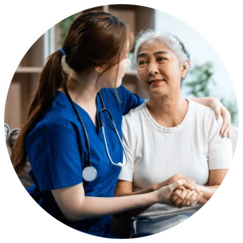 Nurse holding patient's hand